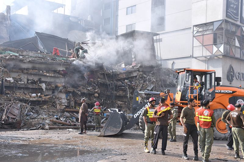 Rescue workers continue to search for missing people in the rubble of Gul Plaza, which collapsed after a devastating fire broke out, killing more than 60 people and leaving dozens missing under the rubble