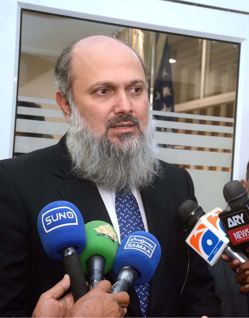 Federal Minister for Commerce Jam Kamal Khan talking to the media after attending a meeting with the American Business Council along with the President of American Business Council at the office of Council