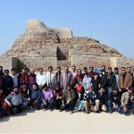 A group photo of the Mohen-Jo-Daro Safari Train delegation of the Sindh Tourism Department during their visit to the world-famous archaeological site of Moen-Jo-Daro