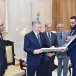 Federal Minister for Information and Broadcasting Attaullah Tarar presents a photo album to the President of the Republic of Uzbekistan, Mirziyoyev Shavkat Miromonovich, in the presence of President Asif Ali Zardari and Prime Minister Muhammad Shehbaz Sharif at Aiwan-e-Sadr