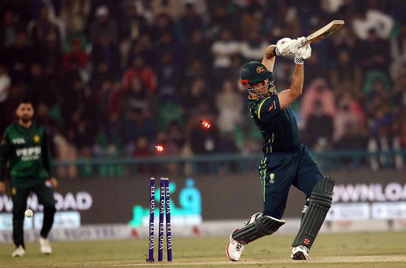 Australia's batter Mitchell Marsh bowled out by Shaheen Afridi during the third Twenty20 international cricket match between Pakistan and Australia at the Gaddafi Stadium